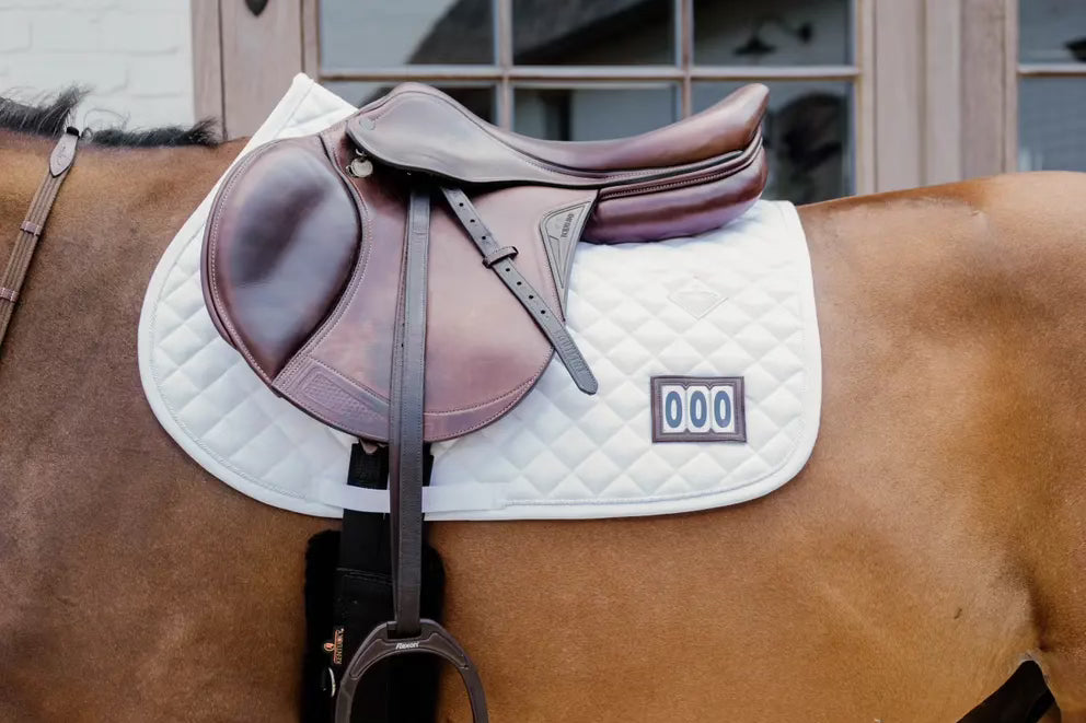 https://equitavisports.ca › products › tapis-de-selle-de-competition-2-numeros-kentucky-horsewear