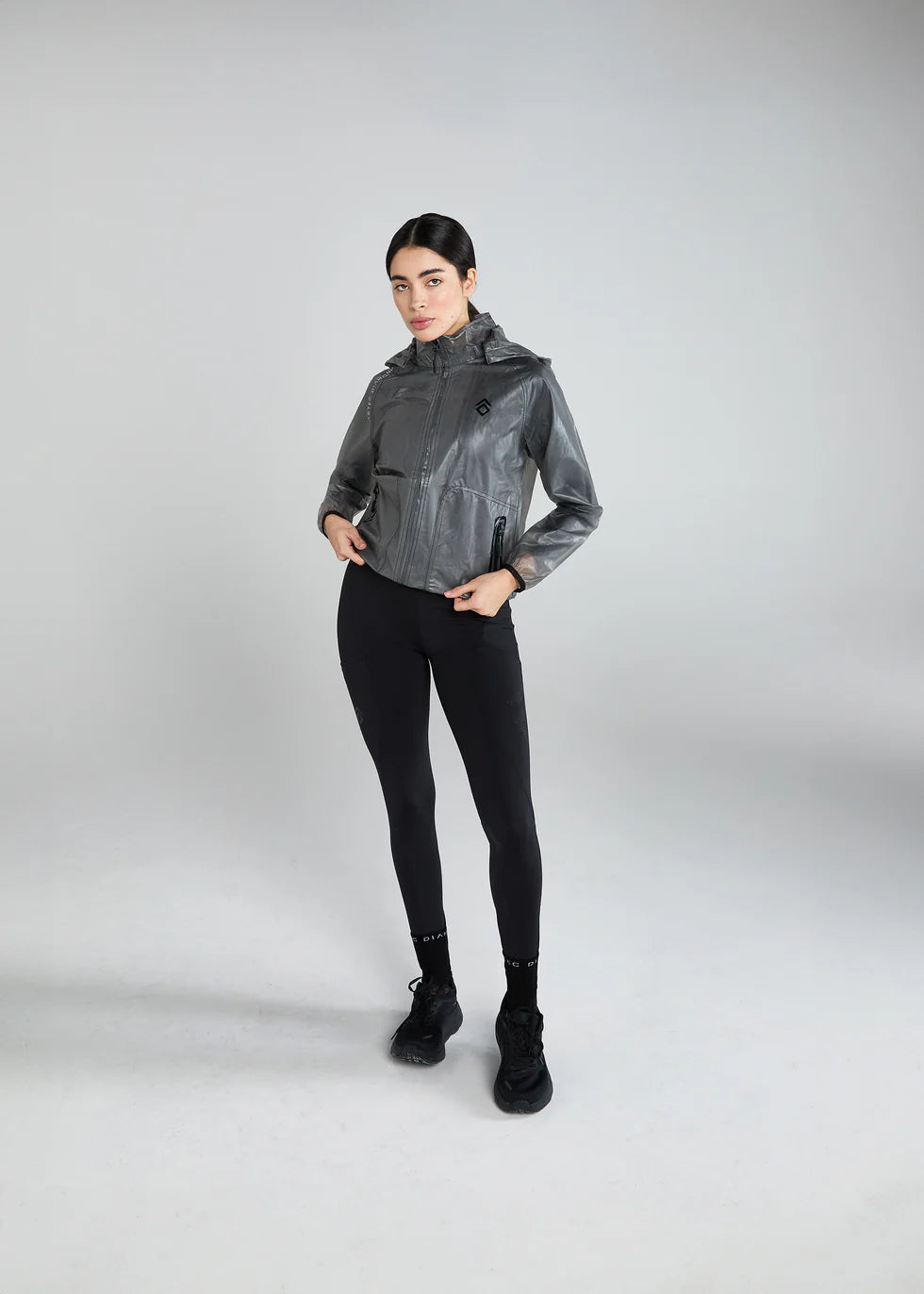 https://equitavisports.ca › products › veste-de-pluie-noire-transparente-aztec-diamond