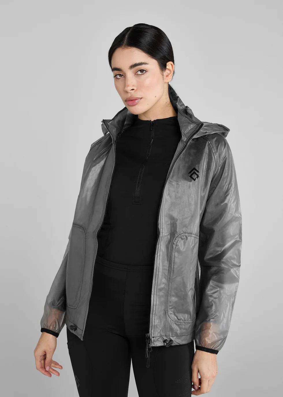 https://equitavisports.ca › products › veste-de-pluie-noire-transparente-aztec-diamond