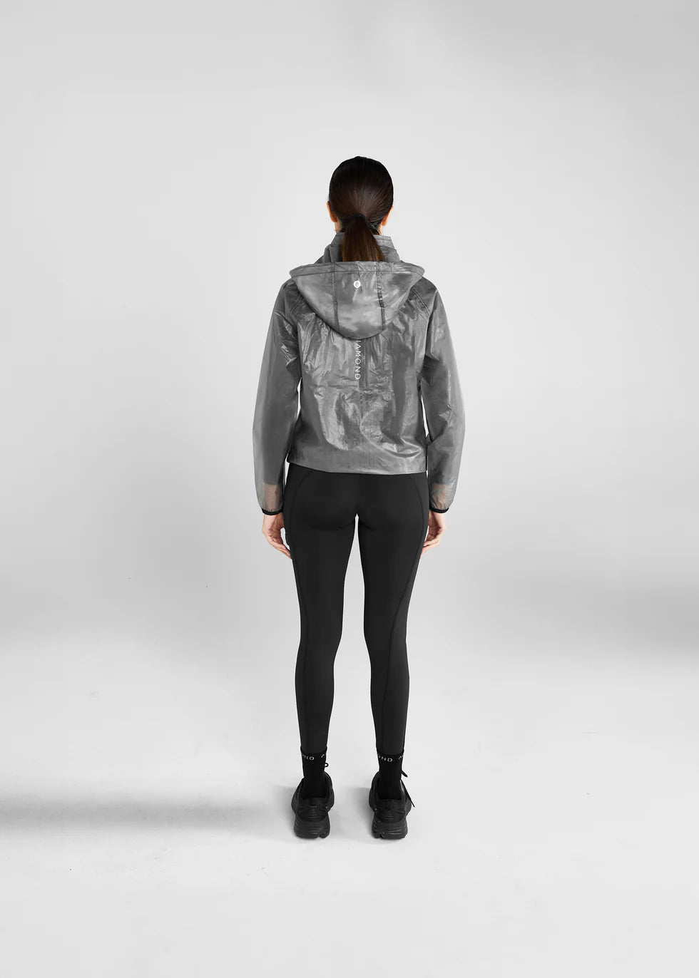 https://equitavisports.ca › products › veste-de-pluie-noire-transparente-aztec-diamond