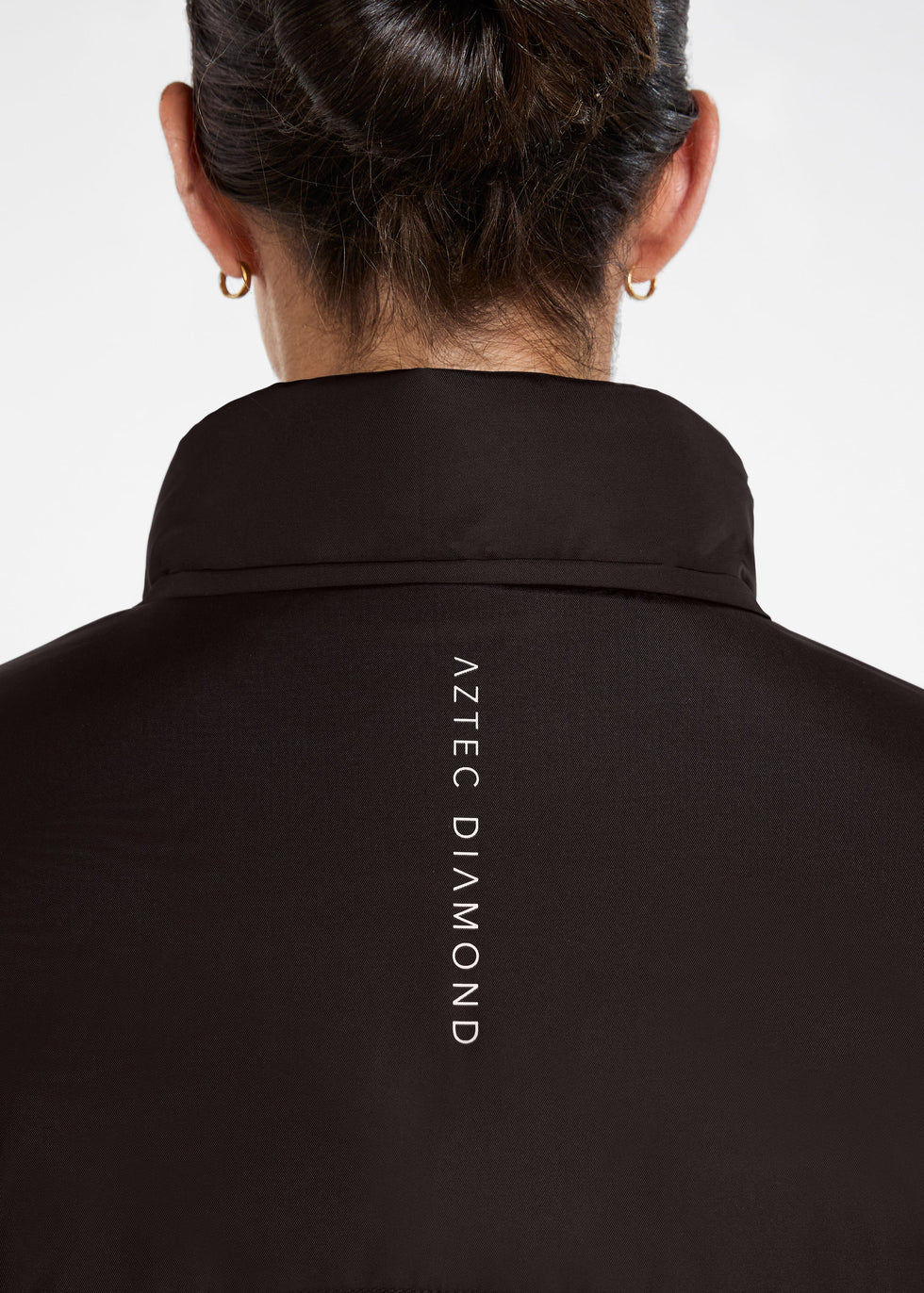 https://equitavisports.ca › products › manteau-de-pluie-impermeable-isole-espresso-aztec-diamond-fw26