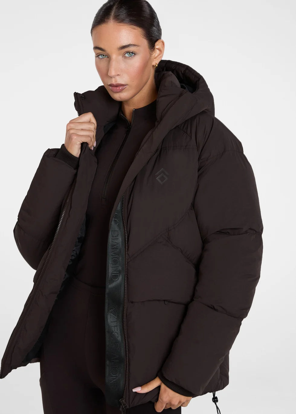 https://equitavisports.ca › products › manteau-d-hiver-puffer-expresso-aztec-diamond-fw26